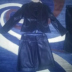 A Butter leather suit. A size 8 petite.Designer